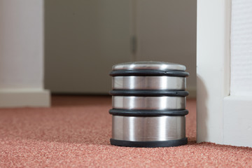 Dusty doorstop in a modern house