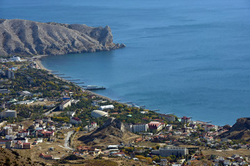 Fototapeta na wymiar View of Sudak town coast from Perchem mountain, Crimea, Russia.