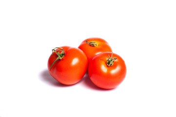 Red tomatoes on a white background