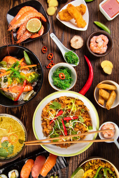 Asian food table with various kind of chinese food
