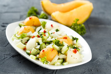 Melon salad with celery, chili and cucumber