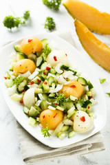 Melon salad with celery, chili and cucumber