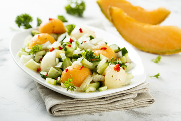 Melon salad with celery, chili and cucumber