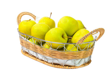 Green apple in a basket on a white background