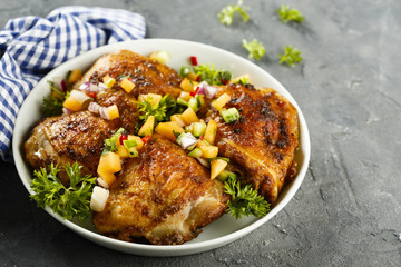 Chicken drumstick with fruit salsa
