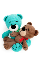 Knitted toy - two striped sitting bears..