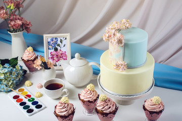Spring morning still life cake in pastel colours with flowers