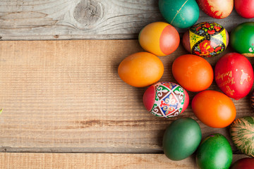Red easter eggs on old wood table, copyspace