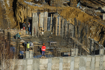 Builders are working on a construction site