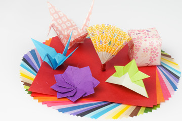Colorful origami papers on white background