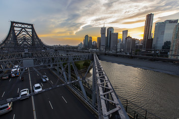 View from the top of Brisbane Story Bridge, with a colourful sunset over Brisbane City