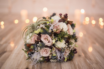 Close-up of bridal bouquet on floor