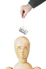 Man teases another person with a bundle of dollars on the thread. Isolated over white background
