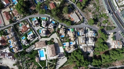 Panoramic drone view of Spanish coastal communities of La Nuccia and Benidorm