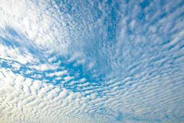 blue sky and fluffy clouds (Cirrocumulus) on nature background texture 
