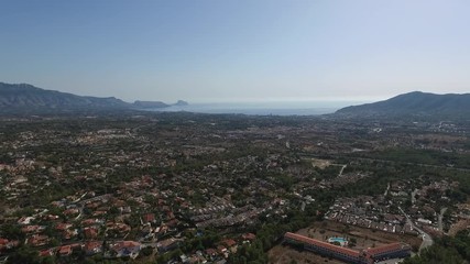 Panoramic drone view of Spanish coastal communities of La Nuccia and Benidorm