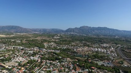 Panoramic drone view of Spanish coastal communities of La Nuccia and Benidorm