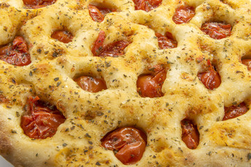 Detail of Apulian flat bread with tomatoes