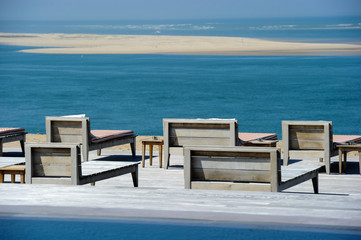 Beautiful tropical beach with chairs and swimingroom