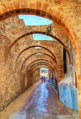Fototapeta na wymiar Arched street in the old town of Safi, Morocco
