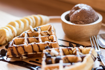 Belgian waffles with fruit and chocolate, forest fruit, all homemade, delicious batter.