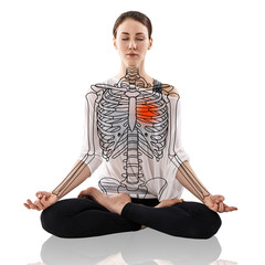 Woman in a yoga pose, with drawing skeleton