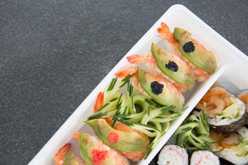Various sushi rolls with shrimp