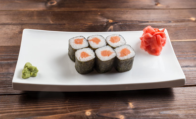 Maki rolls with smoked salmon with wasabi on back front