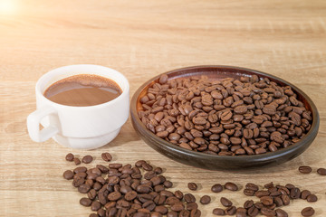 Coffee beans and coffee cup