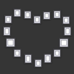 Simple photo frames on wall. Placed in form of silhouette heart. Idea for interior design and decor. 3d render.