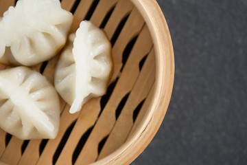 Steamed dumplings in bamboo steamer