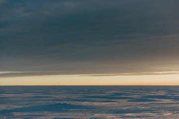 winter landscape - sunset in the snow field © cmirnovalexander