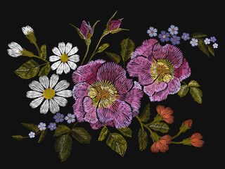 Embroidery colorful floral pattern with dog roses and forget me not flowers. Vector traditional folk fashion ornament on black background.