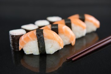 Sushi with chopsticks