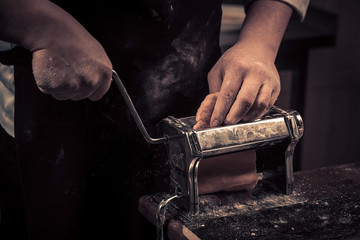 The chef makes fresh pasta from scratch.