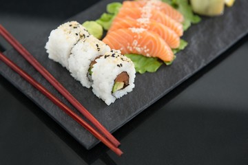 Sushi with chopsticks
