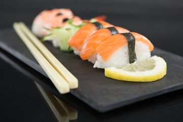 Sushi with chopsticks