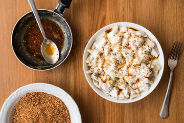 Turkish Manti Manlama / Ravioli with yogurt and fried butter sauce.