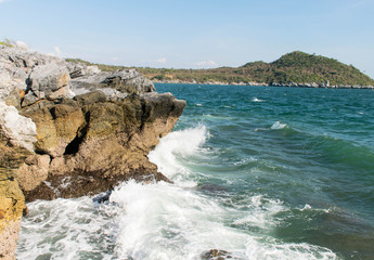 many waves from the sea are impact  rock at the beach