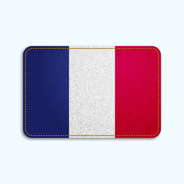 National flag of France with denim texture and orange seam. Realistic image of a tissue made in vector illustration.