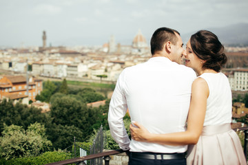 happy couple  kissing in Italy