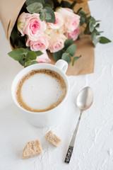 Romantic feminine background with coffee and roses