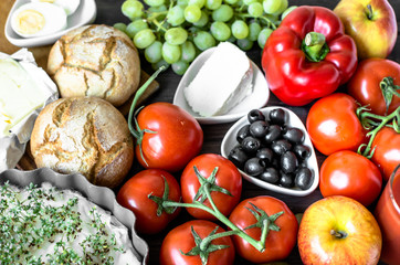 Obraz na płótnie Canvas Healthy breakfast ingredients of vegetarian food, fruits and vegetables