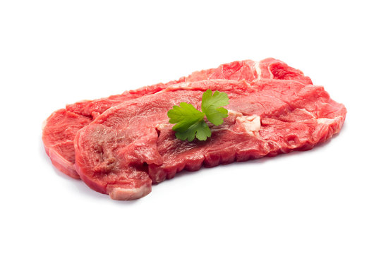Raw beef steak on white