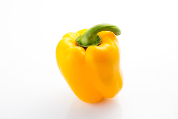 yellow pepper over white background