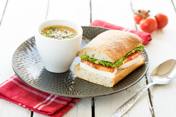 lunch dinner plate fresh cut sandwich ham cheese cup bowl vegetable creamy soup garnish seeds
