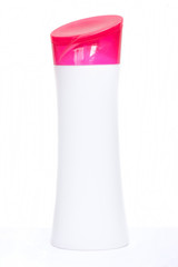 Plastic shampoo bottle on white background.