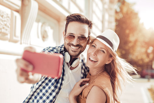 Young couple taking a selfie