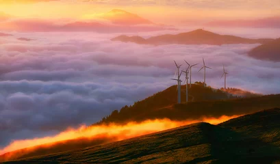 Fotobehang renewable energy with wind turbines © mimadeo