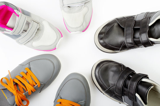 Circle of colorful children shoes